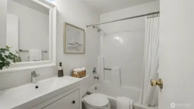 Light, bright, and spacious bathroom.