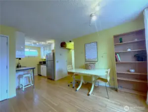 Dining area is open to living room and kitchen.