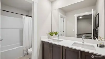 Split bathroom upstairs. Soft close cabinets, quartz countertops!