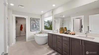 Spa like primary bath with standalone tub, double vanity, soft close cabinets, tiled shower.  Pictures are for representational purposes only, colors and features may vary.
