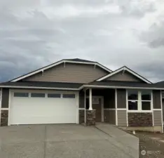 Picture of the actual house.  All other pictures are of a different 1980 plan.  Colors and upgrades may differ from the photos.  The cabinets are not white.