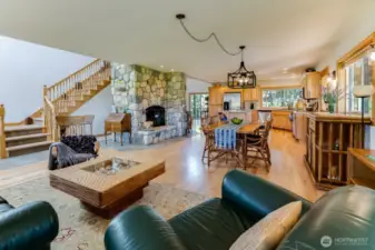 Spacious open floor plan links entertainment, dining, and the kitchen.