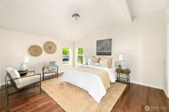 Primary bedroom w/ full bath and walk in closet.