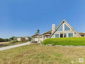 This beautifully updated home sits on a double lot, with an additional lot across the street that helps preserve the stunning, unobstructed view.