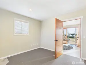 With a stunning custom door, newer carpet, and custom blinds, the office offers comfort and privacy, while providing direct access to the second entrance and half bath.