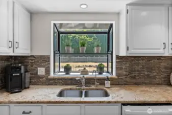 View looking onto back yard from your kitchen sink