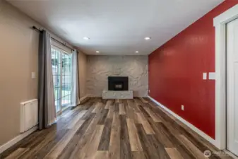family room with doggy door to backyard
