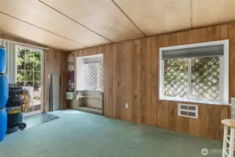 Family Room Den with Slider to outdoor garden area