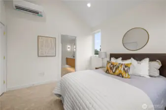 Primary suite with vaulted ceilings