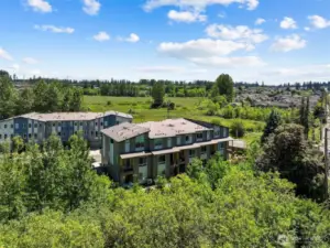 Surrounded by a peaceful greenbelt offering tranquil views of nature.