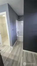 Master Bedroom shower and toilet behind the wall