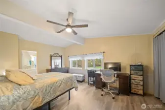 The primary has room for all your furniture and even home office!