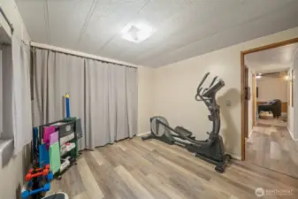 Currently used as workout space, bedroom 3 also has new LVP flooring