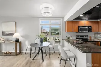Open Kitchen and eating space. Views of the city skyline!