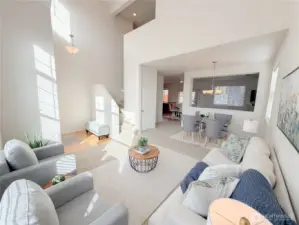 Vaulted ceilings and large windows fill the home with natural light