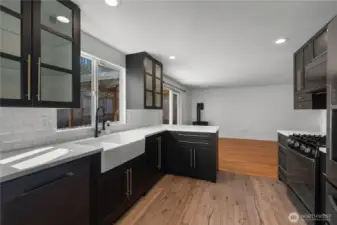 You’ll appreciate the sleek design and exceptional functionality of this beautifully updated kitchen.