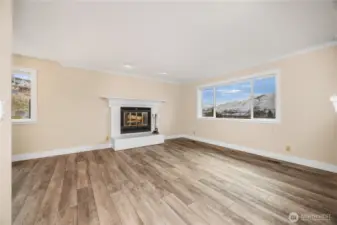 Real wood burning fireplace in upper living.