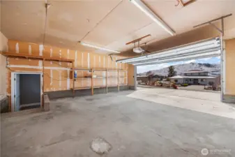 Oversized 2 car garage with ample storage.