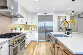 Kitchen shines with high end stainless steel appliances that include a gas cooktop and oven with steam cooking upgrade!