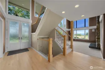 Foyer w/ Living Room to the Right; nearby Dining room and MAIN LEVEL Jr. Suite nearby