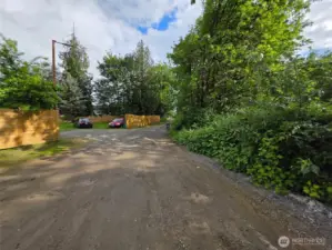 The dirt road leading up to where the property lies beyond