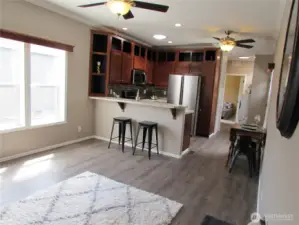 SOLID WOOD CABINETS WITH UPPER DISPLAY AREAS AT TOP.
