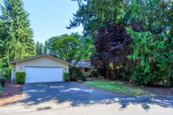 Peaceful wooded setting in Huckleberry near Mill Creek Country Club.