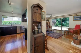 Looking from the hallway into the kitchen and family room.