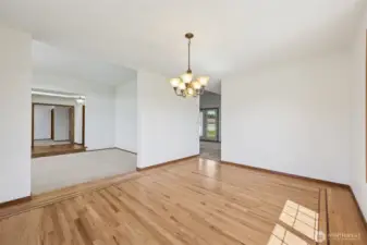 Refinished Hardwood floors with decorative wood inlay.