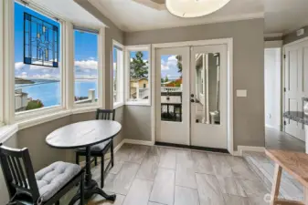 Kitchen eating space with French doors to the deck