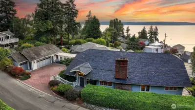 Drone view of the home and sunsets