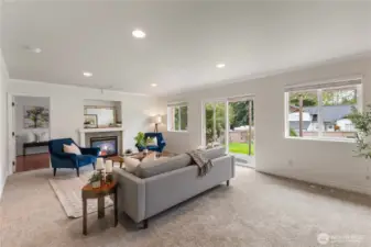 The large family room has a gas fireplace for those chilly evenings when you just want to snuggle up on the couch.
