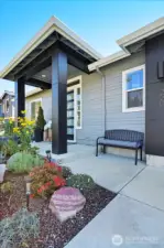 Front entryway to the home with only one step to access the entire main floor which includes the family room, kitchen, office and Primary bedroom.