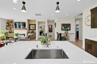 Kitchen facing toward the Great Room and stairs which provide access to the lower walk out floor.