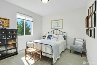 Second bedroom perfect for guests located on the lower floor.