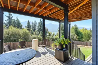 View of the lower back deck for enjoying the views.  This deck also allows easy access to the fenced back yard.