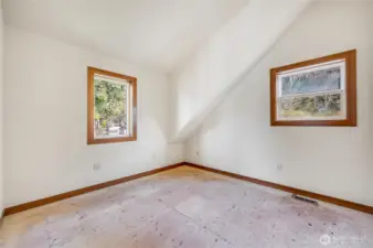 Multi-purpose room could be office or TV room