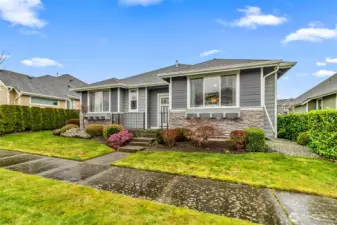 Nice tidy front yard with sidewalks throughout the neighborhood