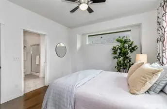 Main suite leading into ensuite bathroom directly attached to bedroom
