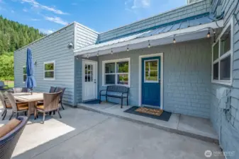 Multiple exterior entrances for multi-family living patio with hottub