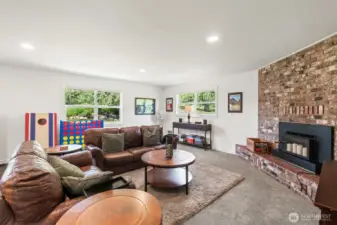 Wood burning fireplace in second living space.