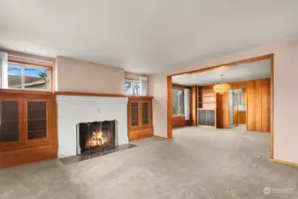 Welcome to this spacious & inviting home. A cozy fireplace with lovely built-ins anchors this charming space. This is Unit 1 and is the entire main level.