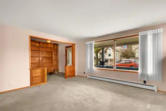 A great view of (Unit 1) the elegant foyer & huge picture window