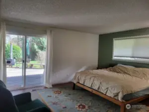 Primary Suite has sliding glass doors to the large back deck