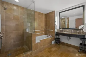 Large shower and separate tub are great for guests wants/needs.