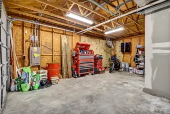 The garage is super sized. There is so much room to roam.