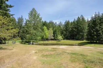 Enjoy the open space, mature trees, and cross fencing