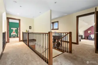 Upstairs boasts 2 large bedrooms, full bath, huge bonus room & additional flex space