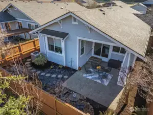 The private back yard has a covered patio where you can enjoy your outdoor evening.