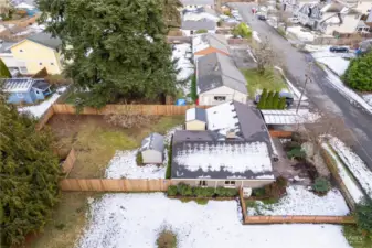 Full view of the property - oversized yard is flat & fully fenced with 2 storage sheds